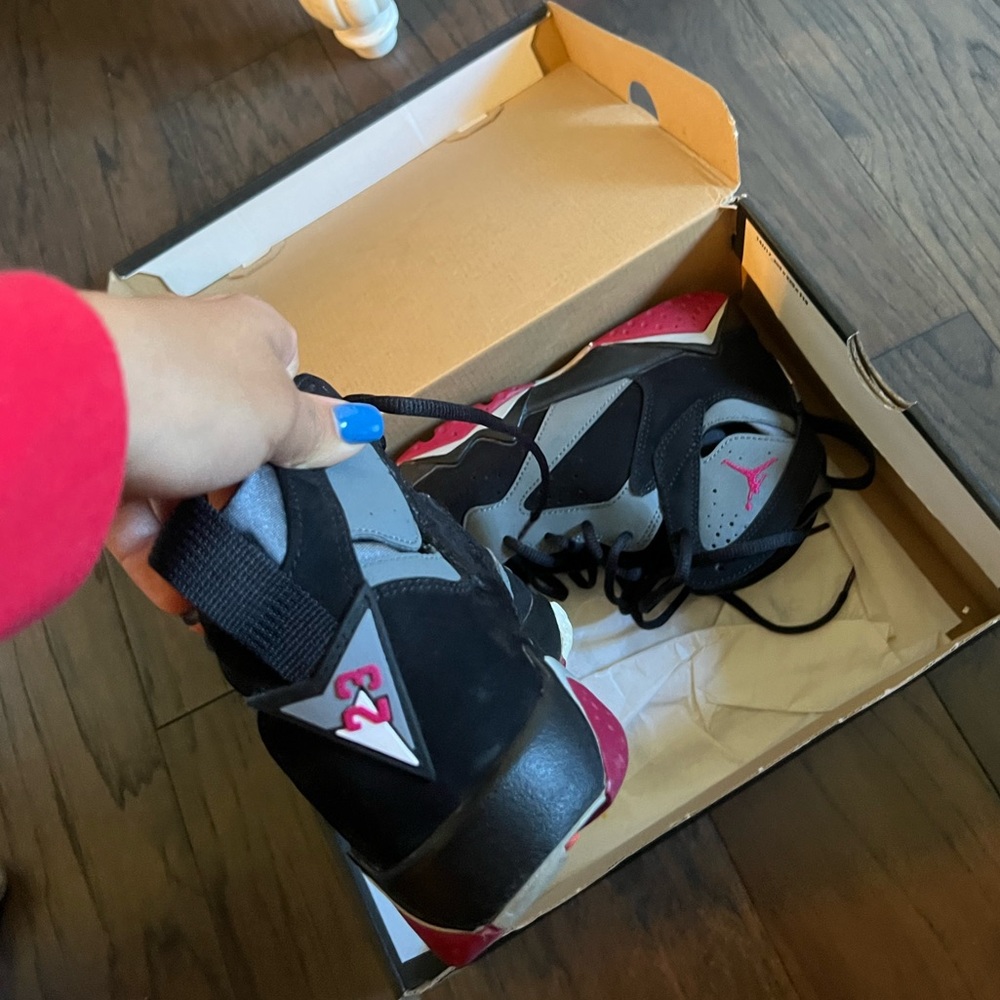 Black red orange and grey Air jordan’s